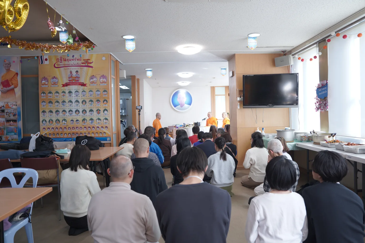 Participants practising together during a temple meditation activity